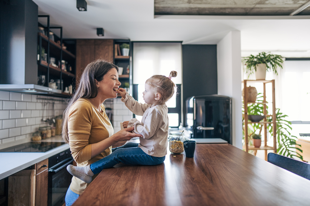 Mother and child in a kitchen